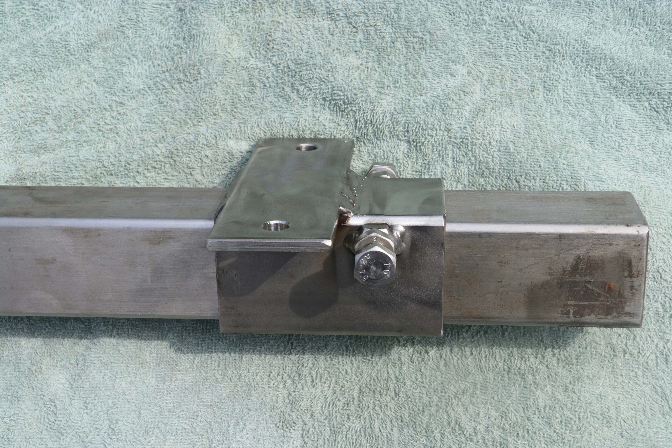 top clamp can be used to join rail lengths , welded to one rail and use bolts provided to clamp other rail